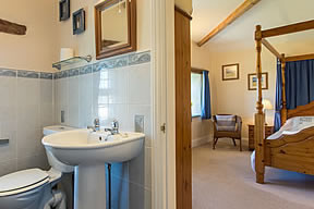 En-suite room with a bath and shower, WC and basin